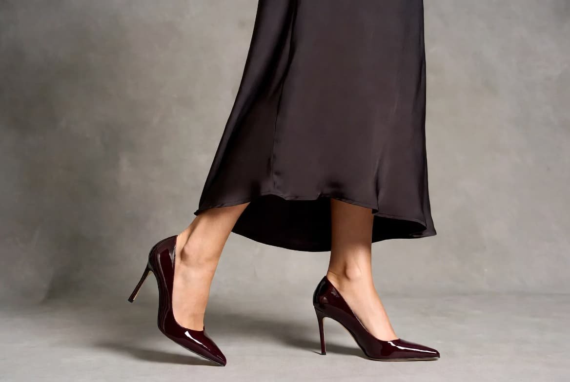 Fashion Flat Lay Of A Drop Waist Dress And Shoes That Maintain The Dresss Line Fashion Flat Lay Of A Drop-Waist Dress And Shoes That Maintain The Dress’s Line.