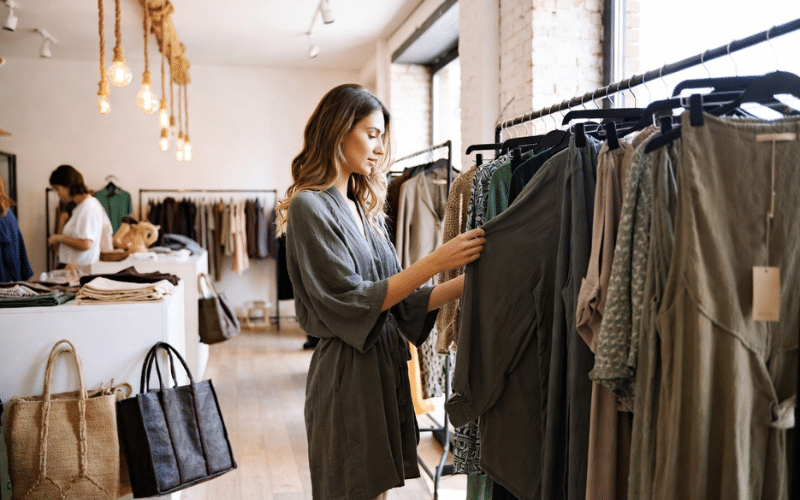 Petite Clothing Pieces From Thrift And Sustainable Brands Arranged For Mindful Shopping.